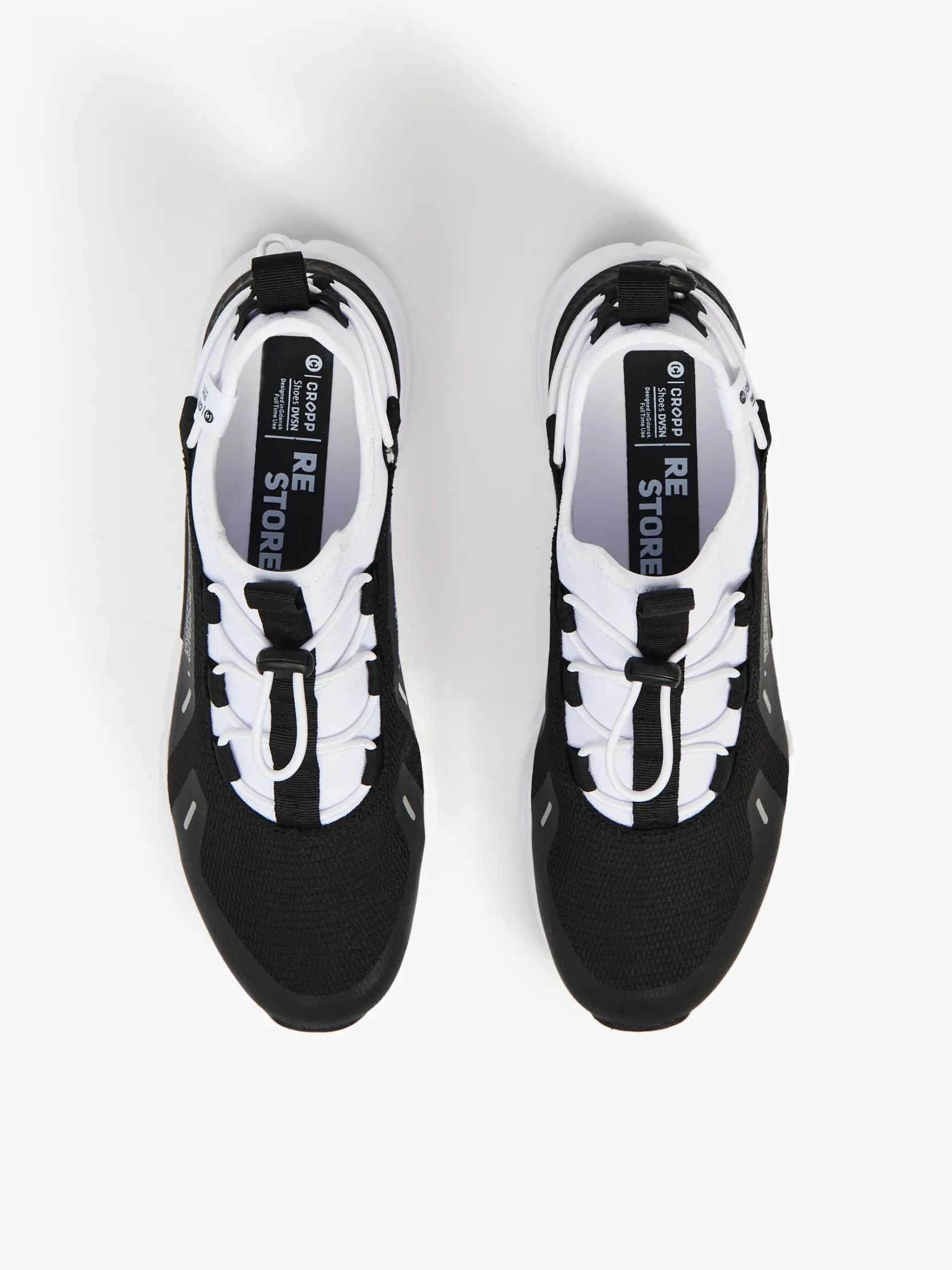 Hot Czarno-białe sneakersy z odblaskowymi detalami Sneakersy