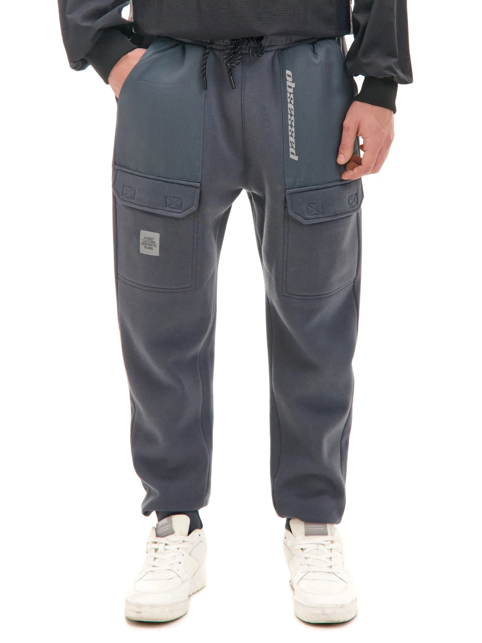 Best Dresowe joggery z efektem reflective Spodnie