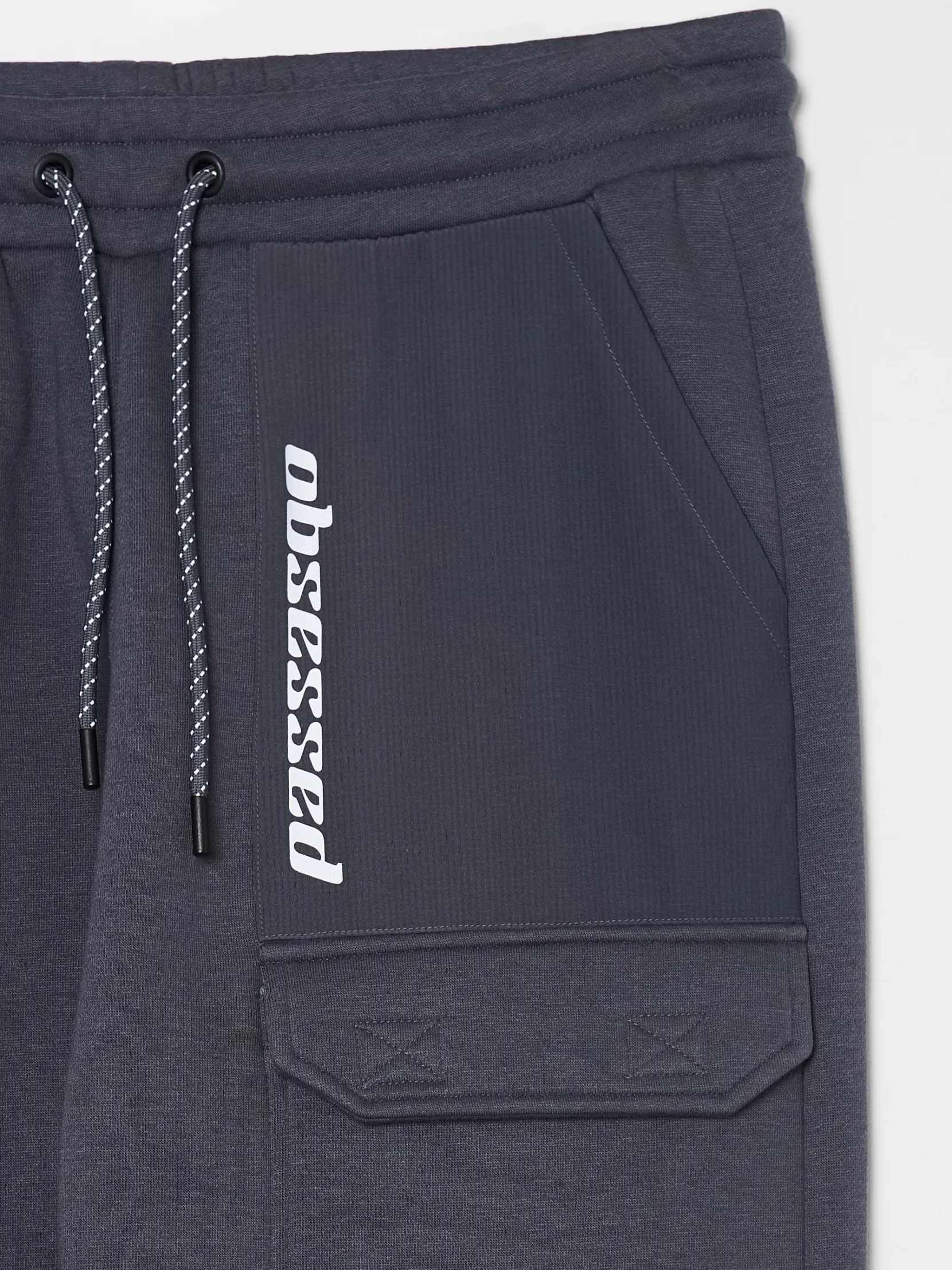 Best Dresowe joggery z efektem reflective Spodnie