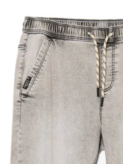Sale Jasnoszare jeansowe joggery regular Jeansy